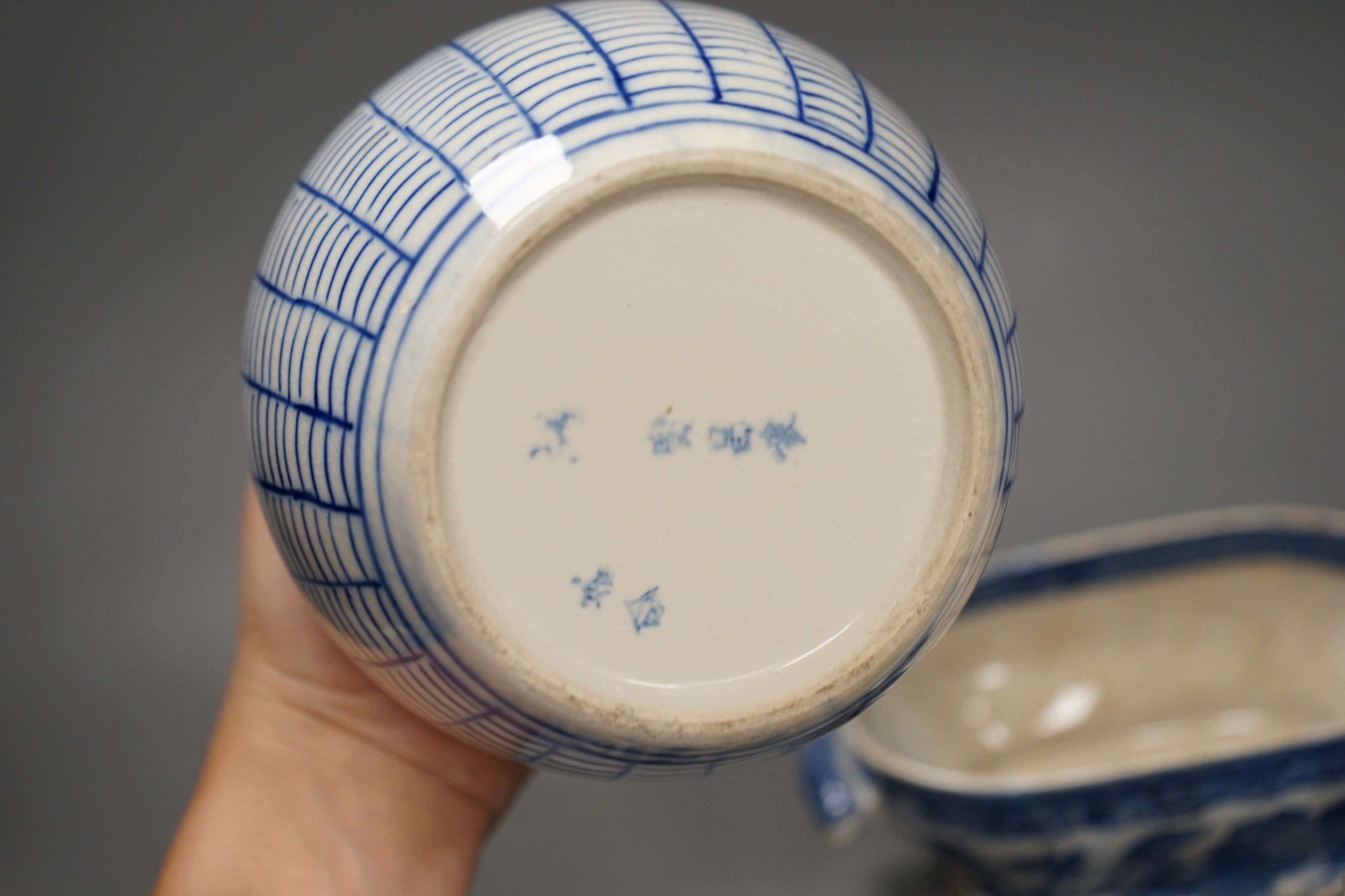 A Chinese famille rose jar and cover, another jar and two English pottery pieces